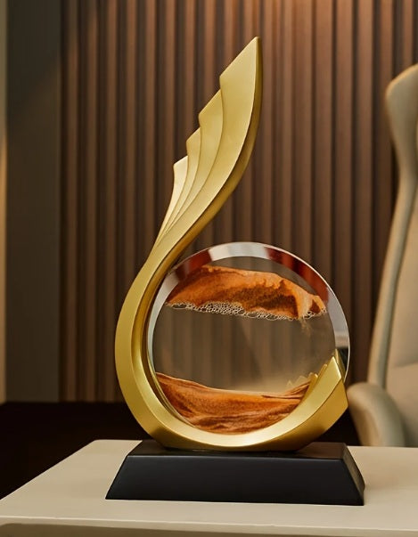 Figura de arena dorada